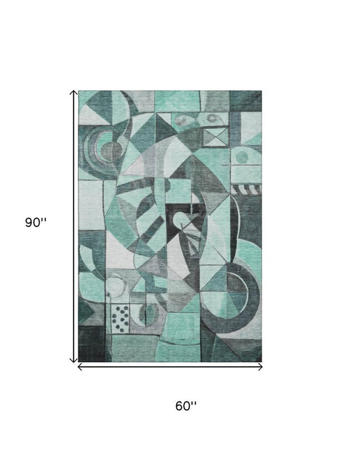 5' X 8' Teal Black And Ivory Abstract Washable Area Rug With UV Protection