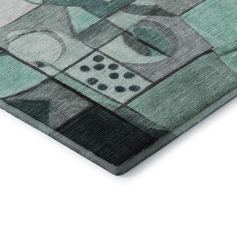 5' X 8' Teal Black And Ivory Abstract Washable Area Rug With UV Protection