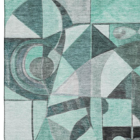 5' X 8' Teal Black And Ivory Abstract Washable Area Rug With UV Protection