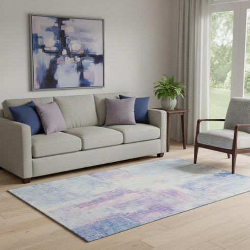5' X 8' Sky Blue And Ivory Abstract Washable Area Rug With UV Protection