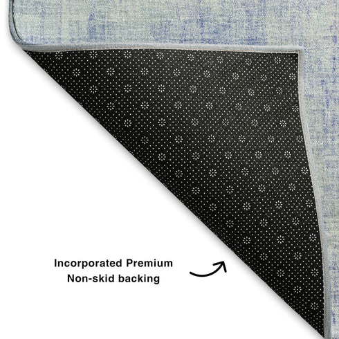 5' X 8' Sky Blue And Ivory Abstract Washable Area Rug With UV Protection