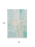 8' X 10' Teal And Ivory Abstract Washable Area Rug With UV Protection
