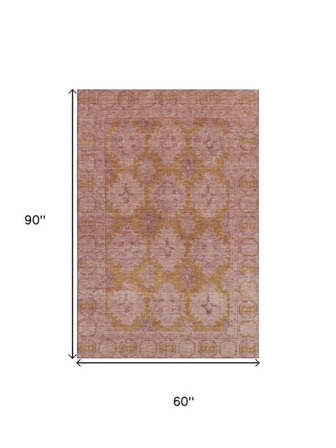 5' X 8' Blush And Orange Oriental Washable Area Rug With UV Protection