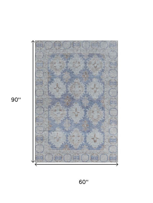 5' X 8' Blue And Brown Oriental Washable Area Rug With UV Protection
