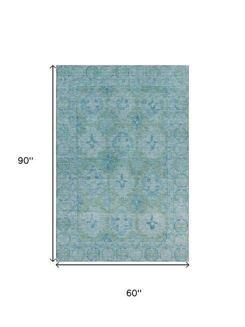 5' X 8' Teal And Aqua Oriental Washable Area Rug With UV Protection