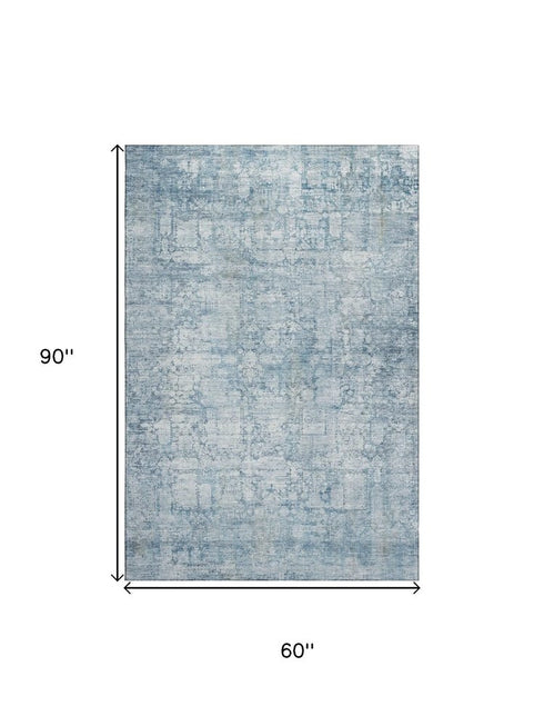 5' X 8' Blue And Ivory Oriental Washable Area Rug With UV Protection