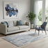 5' X 8' Blue And Ivory Abstract Washable Area Rug With UV Protection