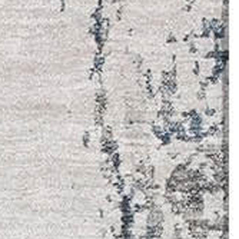 5' X 8' Blue And Ivory Abstract Washable Area Rug With UV Protection