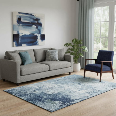 5' X 8' Blue And Ivory Abstract Washable Area Rug With UV Protection