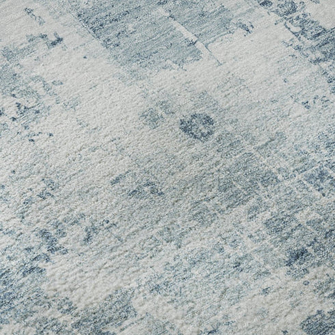 5' X 8' Blue And Ivory Abstract Washable Area Rug With UV Protection