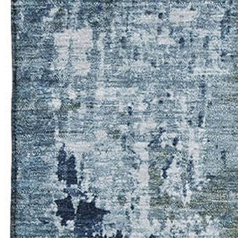 5' X 8' Blue And Ivory Abstract Washable Area Rug With UV Protection