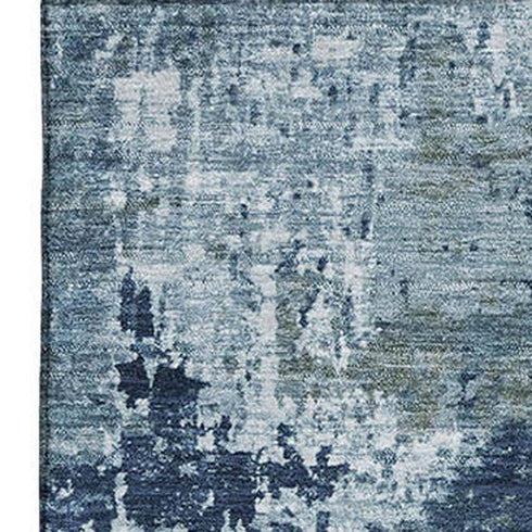 5' X 8' Blue And Ivory Abstract Washable Area Rug With UV Protection