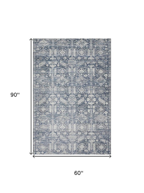 5' X 8' Blue And Ivory Oriental Washable Area Rug With UV Protection