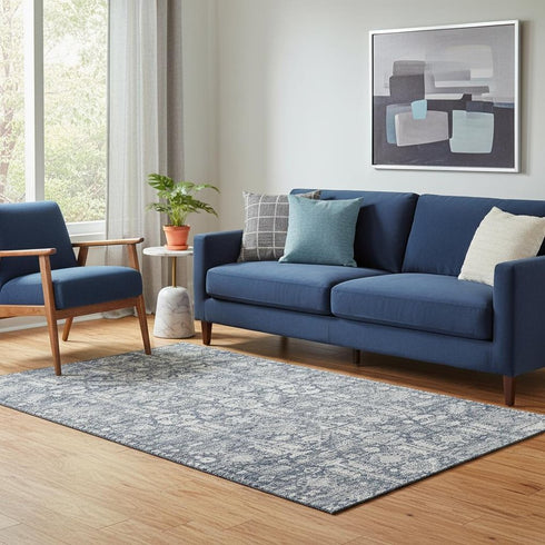5' X 8' Blue And Ivory Oriental Washable Area Rug With UV Protection