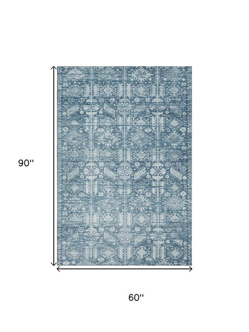5' X 8' Denim Blue And Ivory Oriental Washable Area Rug With UV Protection