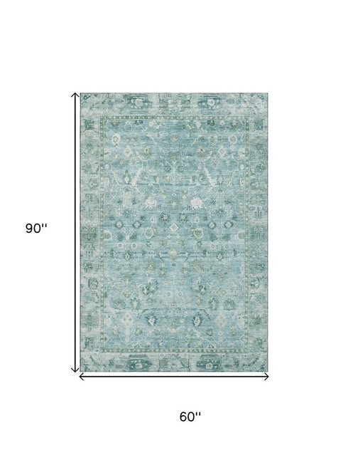 5' X 8' Blue And Ivory Oriental Washable Area Rug With UV Protection