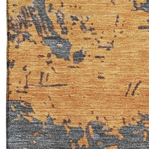 8' X 10' Blue Orange And Ivory Abstract Washable Area Rug With UV Protection