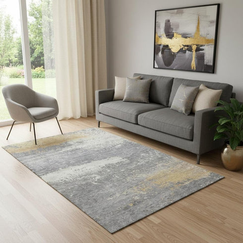 5' X 8' Gold Gray And Ivory Abstract Washable Area Rug With UV Protection