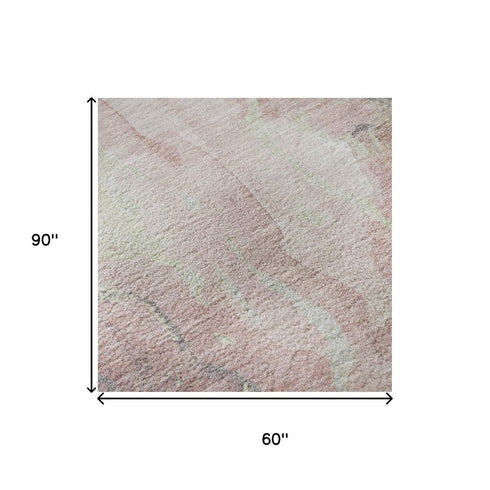 5' X 8' Pink And Beige Abstract Washable Area Rug With UV Protection