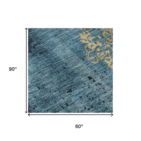 5' X 8' Blue And Gold Floral Washable Area Rug With UV Protection