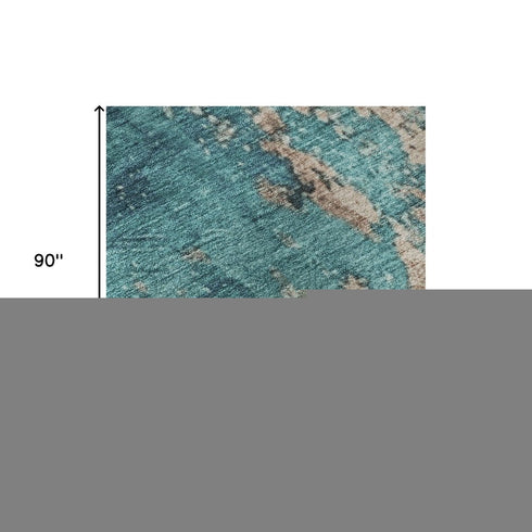 5' X 8' Teal And Beige Abstract Washable Area Rug With UV Protection