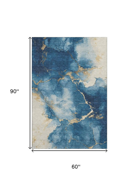 5' X 8' Navy Blue And Gold Abstract Washable Area Rug With UV Protection