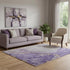 5' X 8' Purple Gold And Ivory Abstract Washable Area Rug With UV Protection