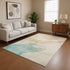 9' X 12' Pearl Teal And Ivory Abstract Washable Area Rug With UV Protection