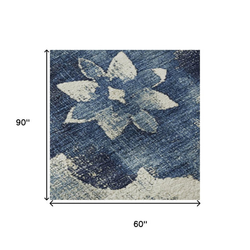 5' X 8' Navy Blue And Ivory Floral Washable Area Rug With UV Protection