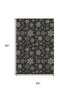 5' X 8' Black Gold And Ivory Abstract Geometric Washable Area Rug With UV Protection