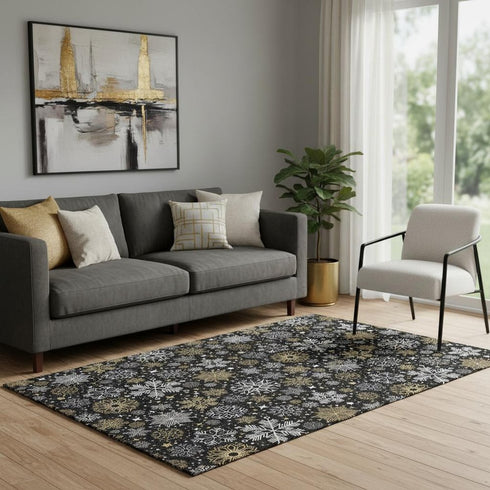 5' X 8' Black Gold And Ivory Abstract Geometric Washable Area Rug With UV Protection
