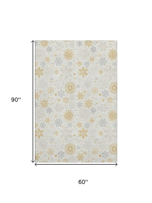 5' X 8' Ivory Gray And Gold Abstract Geometric Washable Area Rug With UV Protection