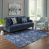 5' X 8' Navy Blue And Ivory Abstract Geometric Washable Area Rug With UV Protection