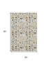 5' X 8' Beige Gold And Gray Floral Washable Area Rug With UV Protection