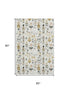 5' X 8' Ivory Gold And Gray Floral Washable Area Rug With UV Protection