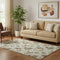 5' X 8' Beige Brown And Ivory Polka Dot Washable Area Rug With UV Protection