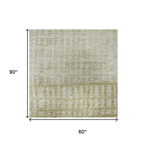 5' X 8' Beige Ivory And Gray Geometric Washable Area Rug With UV Protection