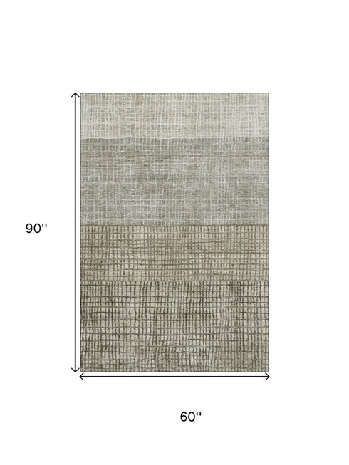 5' X 8' Taupe And Brown Geometric Washable Area Rug With UV Protection