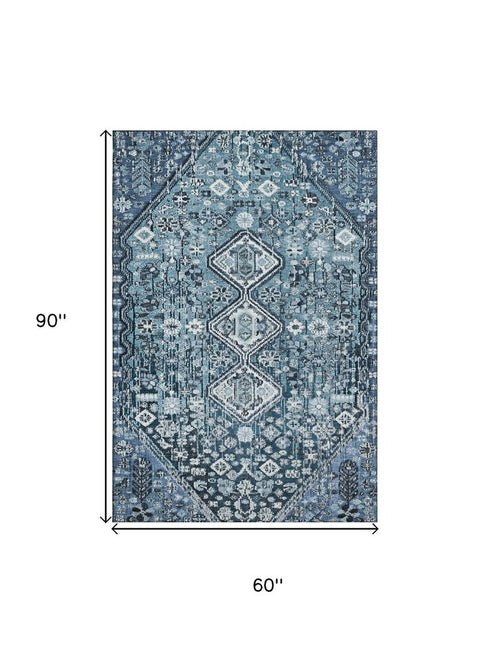 5' X 8' Blue And Ivory Geometric Washable Area Rug With UV Protection