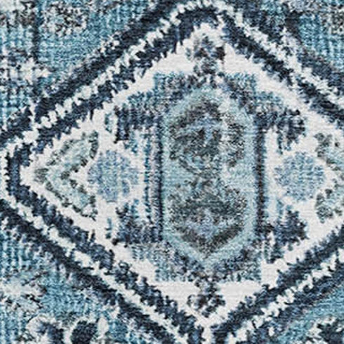 5' X 8' Blue And Ivory Geometric Washable Area Rug With UV Protection