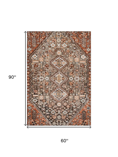 5' X 8' Chocolate Rust And Ivory Geometric Washable Area Rug With UV Protection