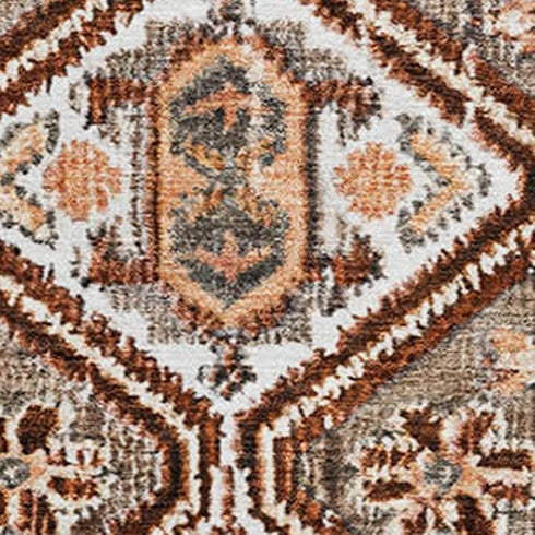 5' X 8' Chocolate Rust And Ivory Geometric Washable Area Rug With UV Protection