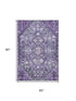5' X 8' Purple And Ivory Geometric Washable Area Rug With UV Protection