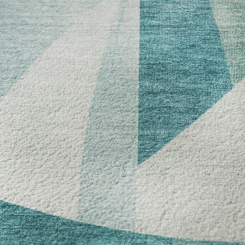 8' X 10' Teal And Ivory Abstract Geometric Washable Area Rug With UV Protection