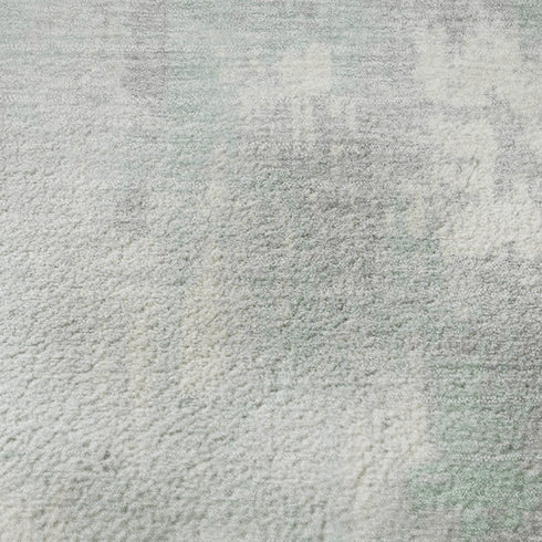 5' X 8' Mint Green And Ivory Abstract Washable Area Rug With UV Protection