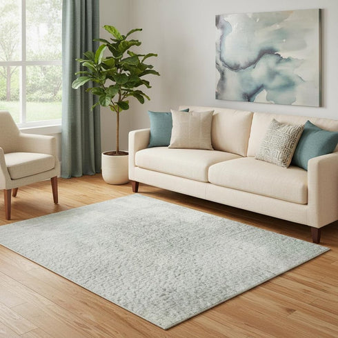 5' X 8' Mint Green And Ivory Abstract Washable Area Rug With UV Protection