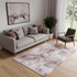 5' X 8' Lavender And Ivory Abstract Washable Area Rug With UV Protection