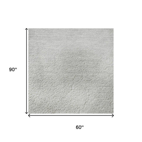 5' X 8' Gray And Ivory Abstract Washable Area Rug With UV Protection