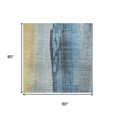 5' X 8' Blue And Gold Abstract Washable Area Rug With UV Protection