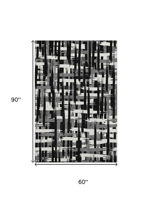 5' X 8' Black And Ivory Striped Washable Area Rug With UV Protection